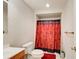 Bathroom featuring a toilet, wood vanity, and a shower with a patterned curtain at 2121 Silva Ct, Conley, GA 30288