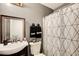 Cozy bathroom with stylish shower curtain, vanity, and contemporary fixtures in a relaxing setting at 2121 Silva Ct, Conley, GA 30288