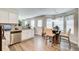 Bright kitchen featuring stainless steel appliances, eat-in area, and hardwood floors at 2121 Silva Ct, Conley, GA 30288