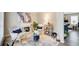Elegant sitting room with fireplace, stylish decor, and view into an open living area at 2121 Silva Ct, Conley, GA 30288