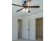 Bedroom featuring a ceiling fan and open access to closet at 220 Nicklaus Cir, Social Circle, GA 30025