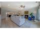 Bright and airy living room with hardwood floors, fireplace, and open floor plan at 220 Nicklaus Cir, Social Circle, GA 30025