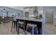 Spacious layout seamlessly integrating the kitchen and living room, perfect for entertaining and Gathering gatherings at 220 Nicklaus Cir, Social Circle, GA 30025