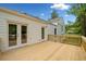 Spacious wooden deck with glass doors offering outdoor living and scenic views at 2920 Alberta Dr, Marietta, GA 30062