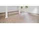 Spacious basement featuring modern wood-look flooring and natural light from egress windows at 2920 Alberta Dr, Marietta, GA 30062