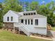A well-maintained home exterior with a lush lawn and mature trees at 2920 Alberta Dr, Marietta, GA 30062