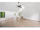 Spacious living room featuring vaulted ceilings, wood floors, and ample natural light at 2920 Alberta Dr, Marietta, GA 30062