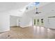 Open-concept living room boasting vaulted ceilings, hardwood floors, and bright windows at 2920 Alberta Dr, Marietta, GA 30062