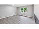 Bright bedroom with large windows and modern flooring at 5857 Earlwane Dr, Lithonia, GA 30058