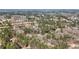 Breathtaking aerial view of the expansive landscape, showcasing the tranquil lake and surrounding woodlands at 65 Deer Run Ln, Mcdonough, GA 30252