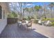 Spacious back deck with outdoor furniture and seating overlooks the backyard at 65 Deer Run Ln, Mcdonough, GA 30252