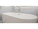 A bathroom showcasing a freestanding tub offers a spa-like experience for relaxation and comfort at 65 Deer Run Ln, Mcdonough, GA 30252
