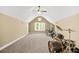 Spacious bonus room with neutral walls, carpet flooring, and window views to exterior at 65 Deer Run Ln, Mcdonough, GA 30252