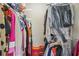 A well-stocked walk in closet with shelving and hanging storage space at 65 Deer Run Ln, Mcdonough, GA 30252