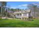 Charming single-Gathering home with stone accents, dormer windows and a beautifully landscaped front yard at 65 Deer Run Ln, Mcdonough, GA 30252