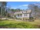 Charming single-Gathering home with stone accents, dormer windows and a beautifully landscaped front yard at 65 Deer Run Ln, Mcdonough, GA 30252