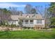 Charming single-Gathering home with stone accents, dormer windows and a beautifully landscaped front yard at 65 Deer Run Ln, Mcdonough, GA 30252
