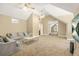 Spacious room with carpet flooring, neutral colors and a vaulted ceiling at 65 Deer Run Ln, Mcdonough, GA 30252
