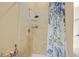 Shower with glass shelves and modern rainfall shower head at 65 Deer Run Ln, Mcdonough, GA 30252