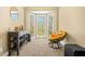 A cozy nook with a large picture window and an accent chair at 65 Deer Run Ln, Mcdonough, GA 30252