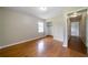 Bright bedroom features hardwood floors, a window, and a closet at 87 Virgil Sw St, Mableton, GA 30126