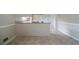 Kitchen view features a breakfast bar and tile floors leading to dining area at 87 Virgil Sw St, Mableton, GA 30126