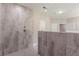 Luxurious tiled shower with rainfall shower head and tile flooring, with open access at 150 Whitworth Dr, Locust Grove, GA 30248