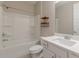Bathroom featuring a shower-tub combo and a white vanity with sink and a large mirror at 150 Whitworth Dr, Locust Grove, GA 30248
