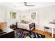 Bright bedroom with hardwood floors, ample natural light, neutral walls, and a ceiling fan offering a cozy retreat at 228 Olympic Pl # 47, Decatur, GA 30030