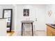 Cozy eat-in kitchen with tile flooring, wood cabinets, granite counters, and a nearby living area offering easy entertaining at 228 Olympic Pl # 47, Decatur, GA 30030