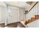 Bright entryway boasting hardwood floors, staircase, and natural light at 27 Jefferson Hill Ne Pl, Atlanta, GA 30342