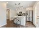 Modern kitchen featuring a center island with pendant lighting and stainless steel appliances at 27 Jefferson Hill Ne Pl, Atlanta, GA 30342