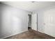 Bedroom with light-grey walls, carpet, and entry to an en suite bathroom at 3949 Riverside Pkwy, Decatur, GA 30034