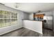 Open kitchen layout with stainless steel appliances and breakfast bar at 3949 Riverside Pkwy, Decatur, GA 30034