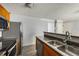 Well-lit kitchen features stainless steel appliances and wood cabinets at 3949 Riverside Pkwy, Decatur, GA 30034