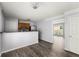 Open kitchen with wood cabinets, stainless steel appliances, and breakfast bar at 3949 Riverside Pkwy, Decatur, GA 30034