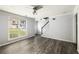 Inviting living room with wood floors, staircase, and neutral walls at 3949 Riverside Pkwy, Decatur, GA 30034