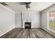 Bright living room with hardwood floors, fireplace and white trim at 3949 Riverside Pkwy, Decatur, GA 30034