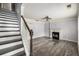 Spacious living room with fireplace, hardwood floors, and staircase at 3949 Riverside Pkwy, Decatur, GA 30034