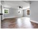 Spacious bedroom with wood floors, neutral paint, ceiling fan and lots of natural light at 8420 Sheridan Dr, Jonesboro, GA 30236