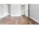 Bedroom featuring hardwood floors and a closet at 8420 Sheridan Dr, Jonesboro, GA 30236