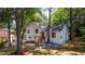 Attractive, freshly painted two-story house with new landscaping, walkway, and inviting entry stairs at 8420 Sheridan Dr, Jonesboro, GA 30236