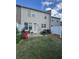The home features a well-maintained backyard with a patio area and green grass at 961 Pierce Ivy Ct, Lawrenceville, GA 30043