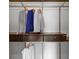 Organized closet with clothing hanging and shelves and drawers for folded items at 10 Perimeter Summit Ne Blvd # 4243, Brookhaven, GA 30319