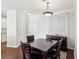 Charming dining area with a modern table, chairs, and elegant lighting fixtures at 10 Perimeter Summit Ne Blvd # 4243, Brookhaven, GA 30319