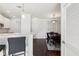 Bright dining room featuring hardwood floors and modern lighting fixtures, adjacent to kitchen at 10 Perimeter Summit Ne Blvd # 4243, Brookhaven, GA 30319