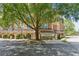 Villa Sonoma Condominiums featuring mature trees and meticulously maintained landscaping at 10 Perimeter Summit Ne Blvd # 4243, Brookhaven, GA 30319