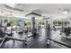 Bright fitness center with updated equipment, rubber flooring, and large windows at 10 Perimeter Summit Ne Blvd # 4243, Brookhaven, GA 30319