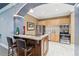 A charming kitchenette featuring granite countertops, stainless steel appliances, and wood cabinets at 10 Perimeter Summit Ne Blvd # 4243, Brookhaven, GA 30319