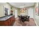 Small poker room with table, chairs, and kitchenette at 10 Perimeter Summit Ne Blvd # 4243, Brookhaven, GA 30319